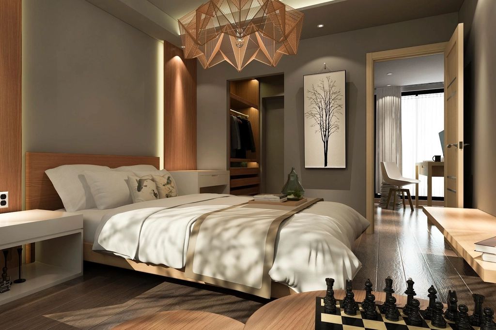 A guest room with two beds and a window